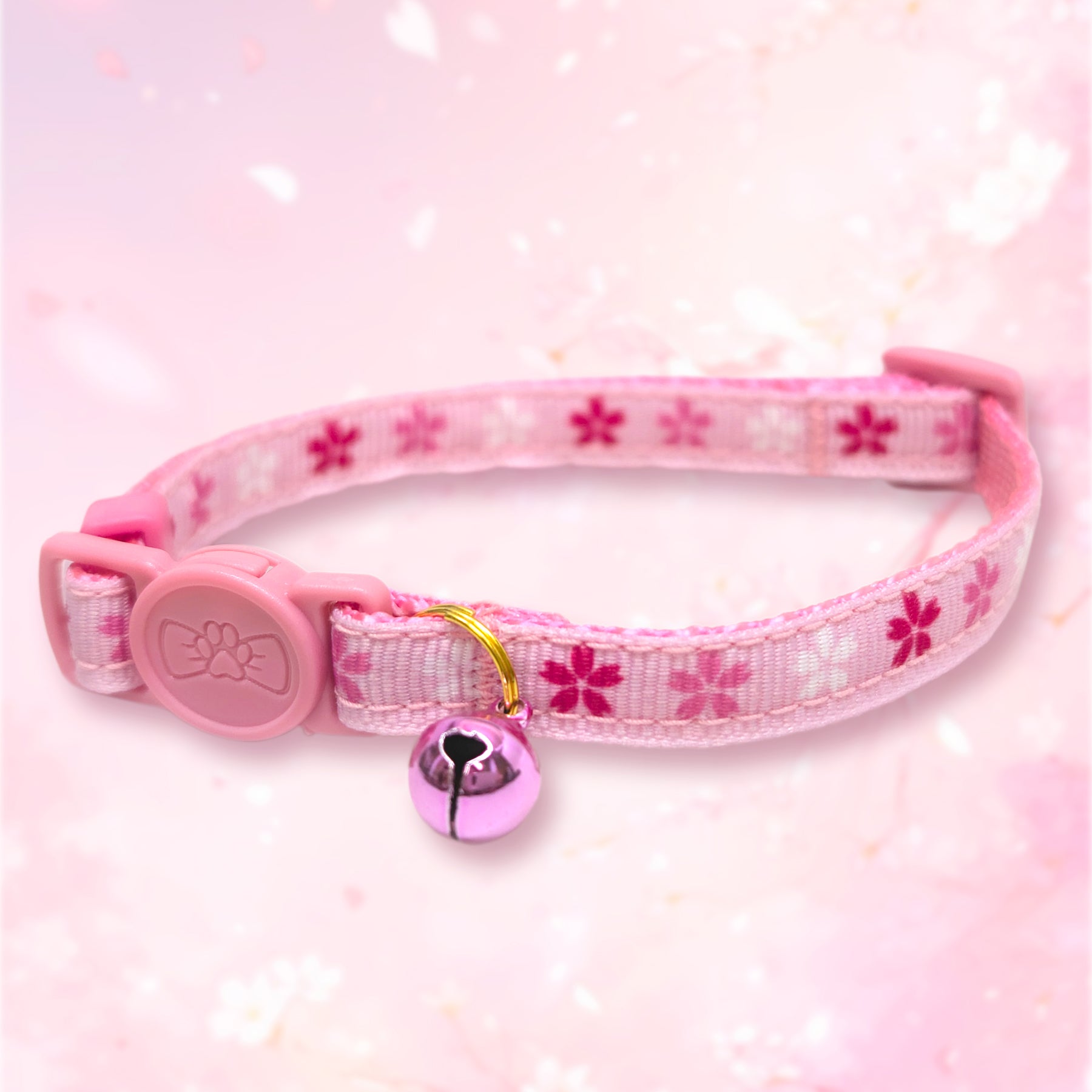 Cherry Blossom Cat Collar by Pawsonify - An elegant cat collar adorned with a cherry blossom pattern, featuring a breakaway clasp for safety and a removable bell for added charm. #size_Cat: 8-12"