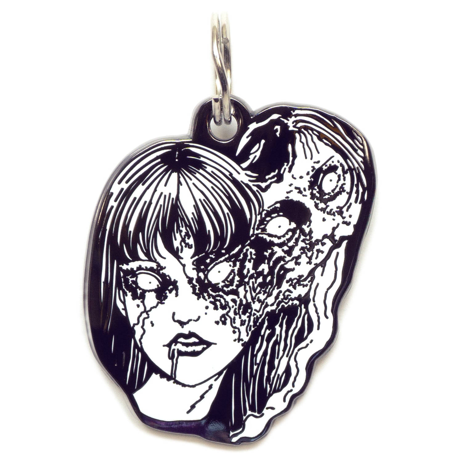  A pet tag featuring Tomie, a captivating yet terrifying character from Junji Ito's manga, known for her alluring beauty and supernatural ability to regenerate.